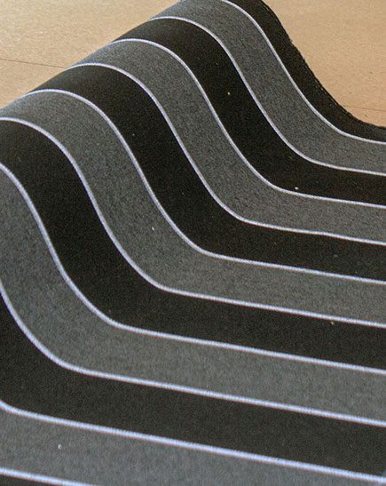 a close-up of striped outdoor cushion fabric